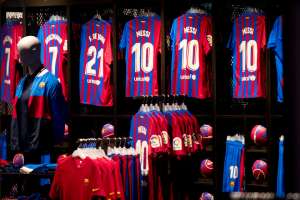 Fans of Barcelona are buying Leo Messi T-shirts en masse